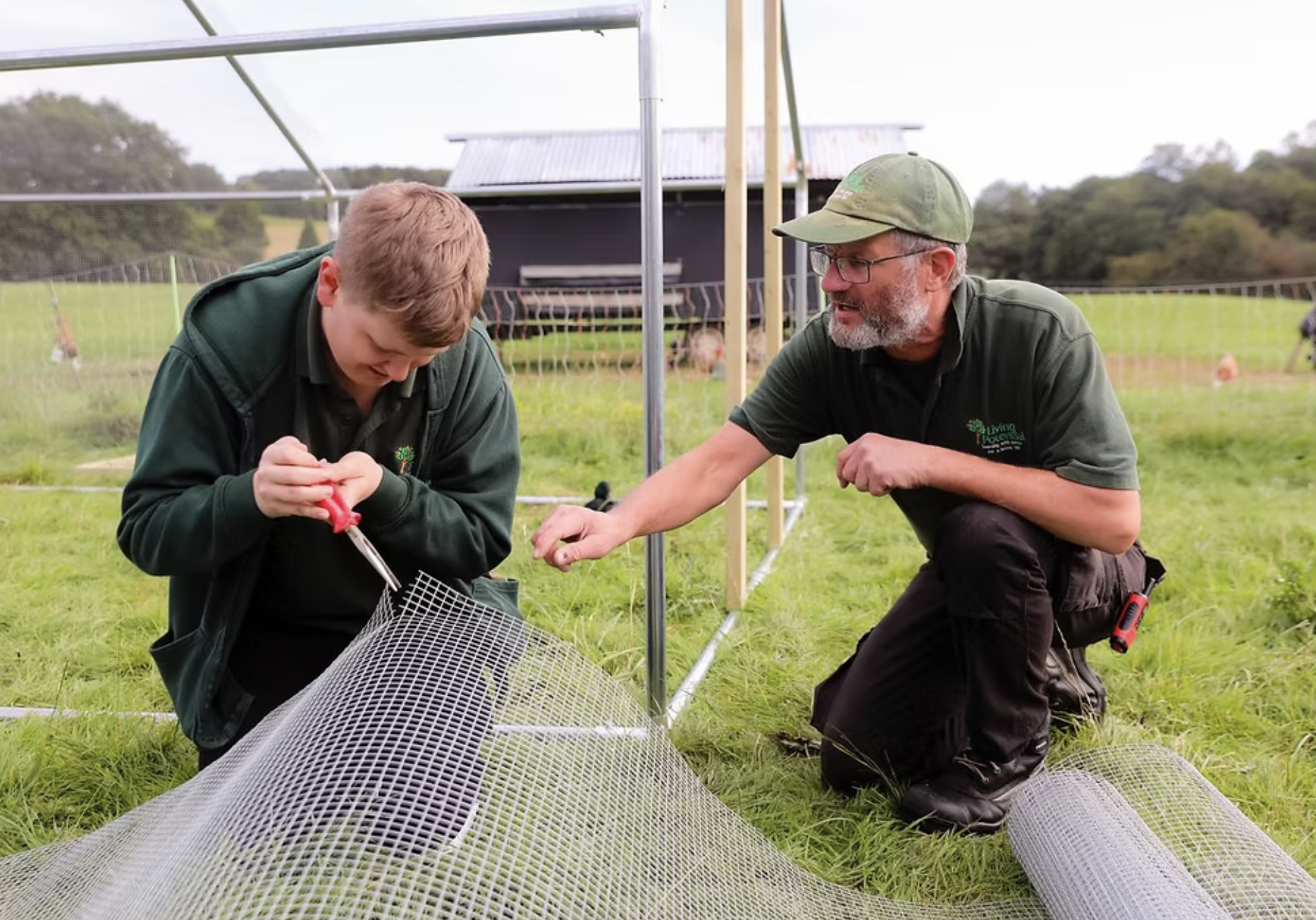 Imagery of working as a team to secure the duck hut